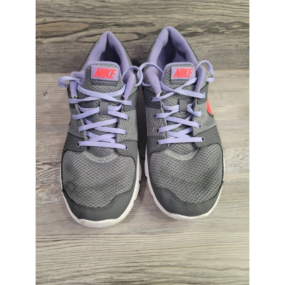 Nike flex experience running 12 woman's gray and purple.